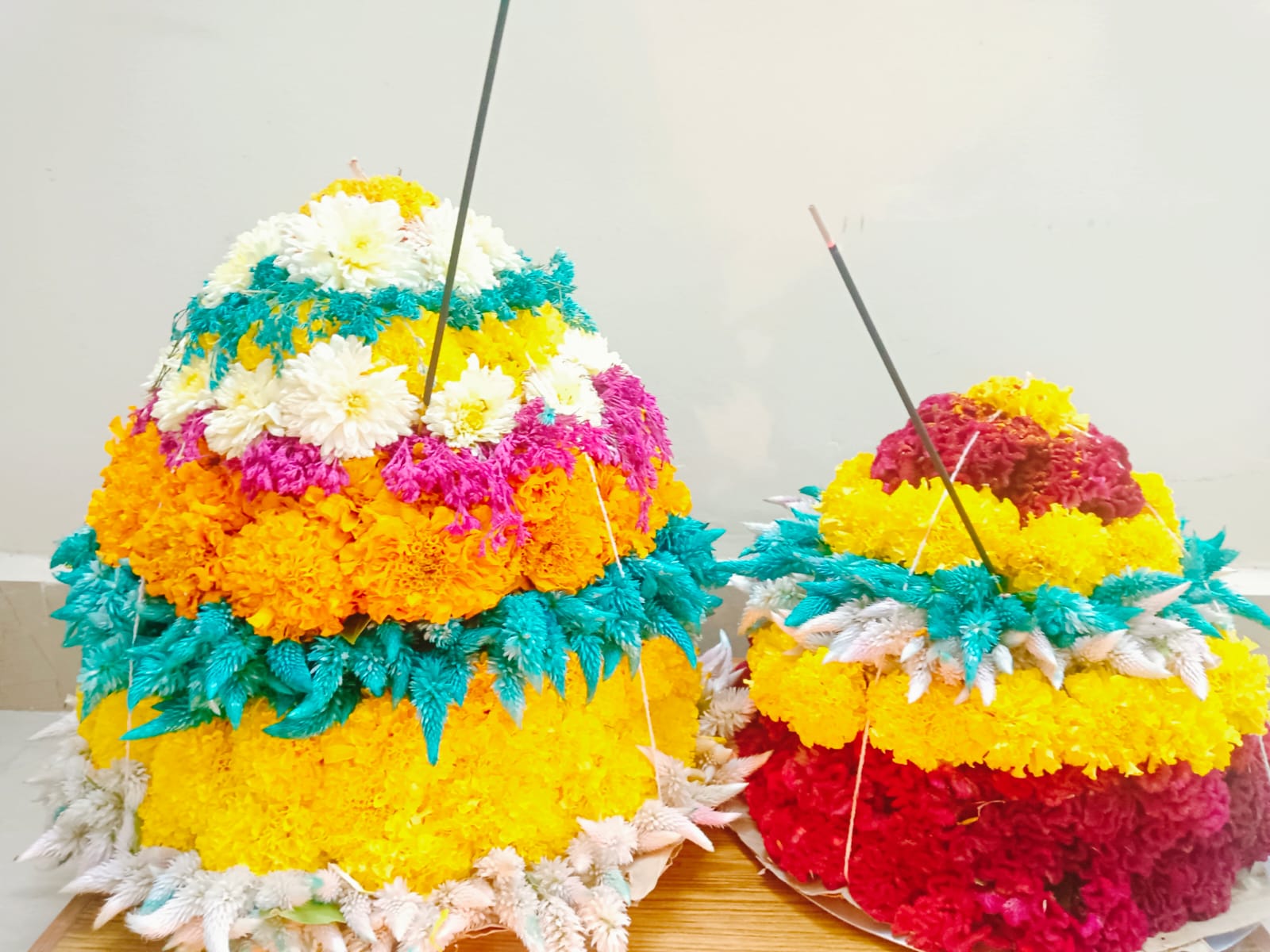 Colourful Bathukamma flower arrangement